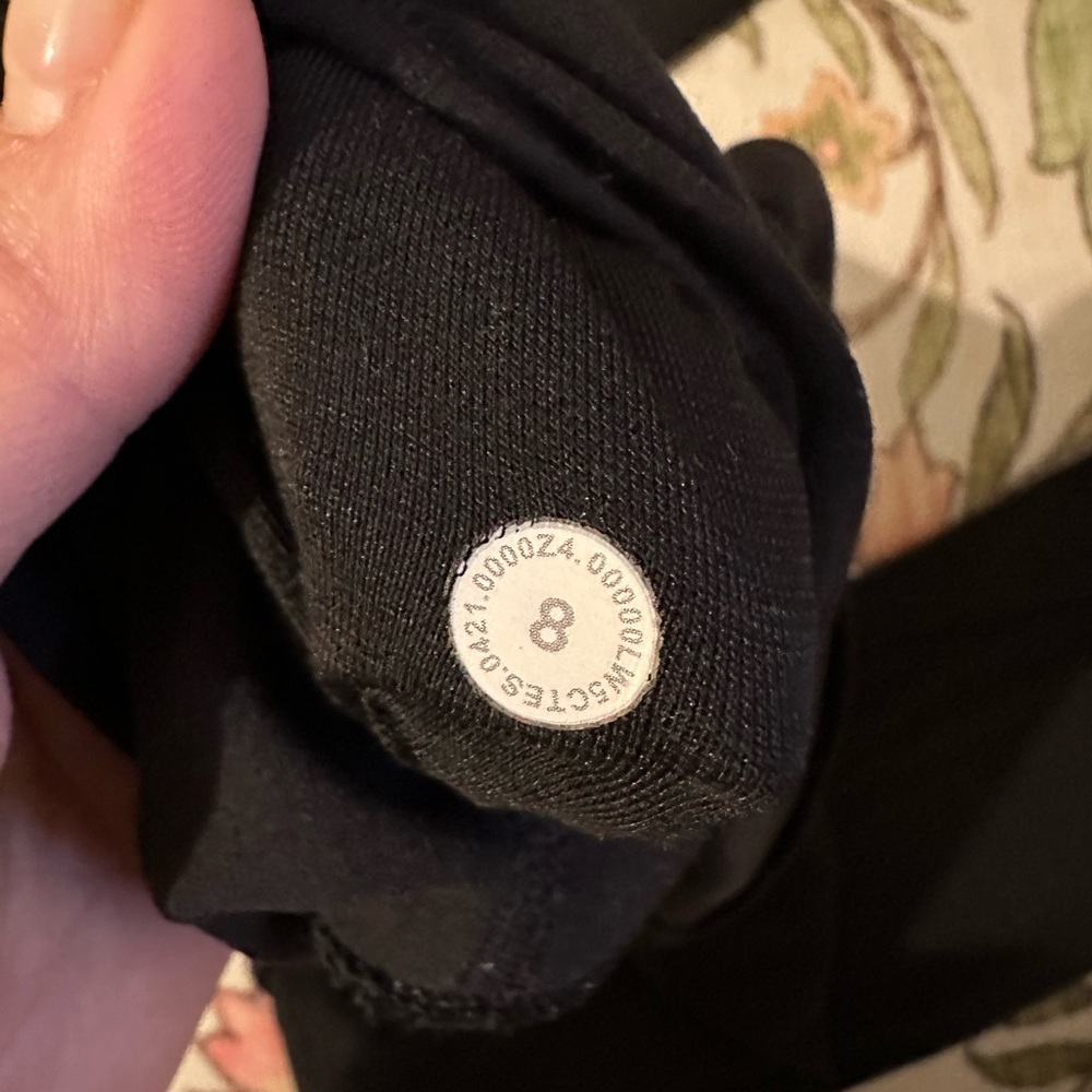 TWO PAIRS of black lululemon 25” align pant legging